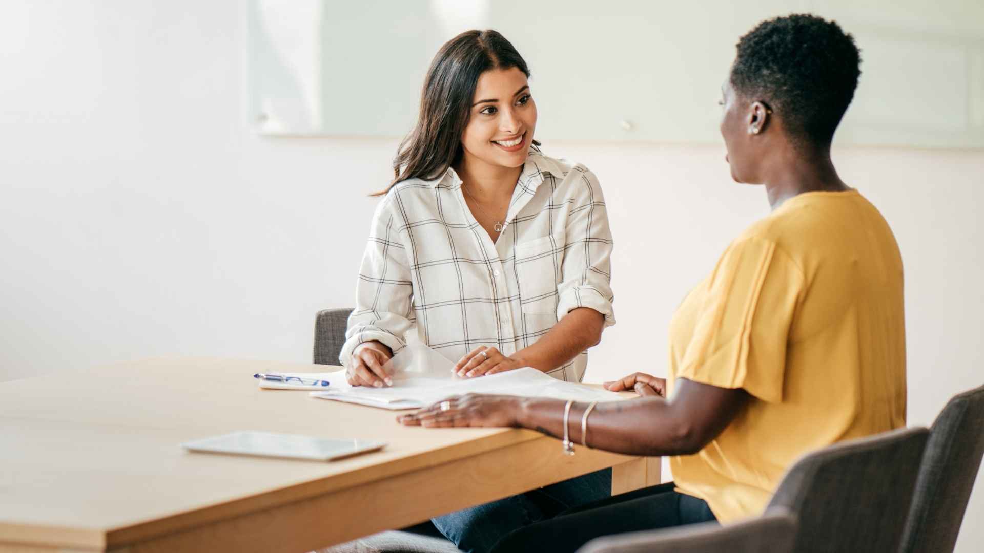 Two women in a one-to-one mentoring session